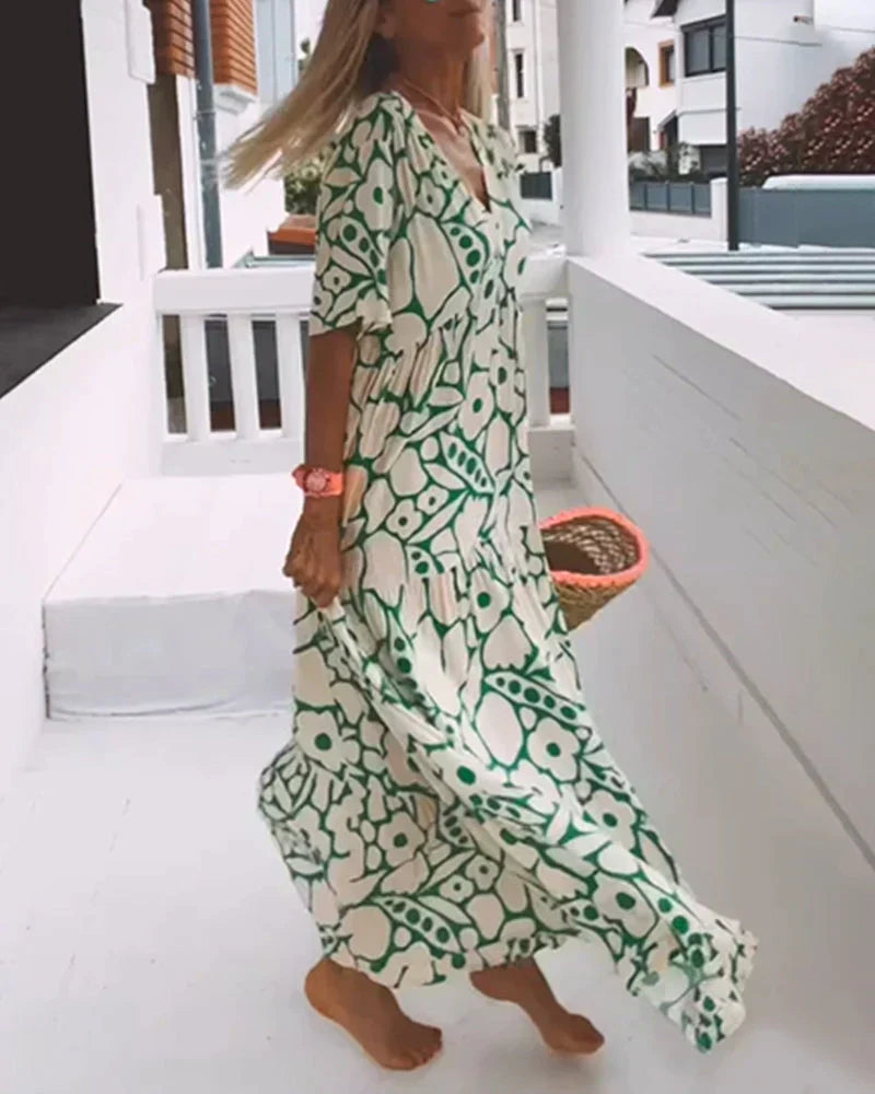 CHRISTINE™ | Lange Zomerjurk met Vloeiende Snit en Elegante Grafische Ontwerp