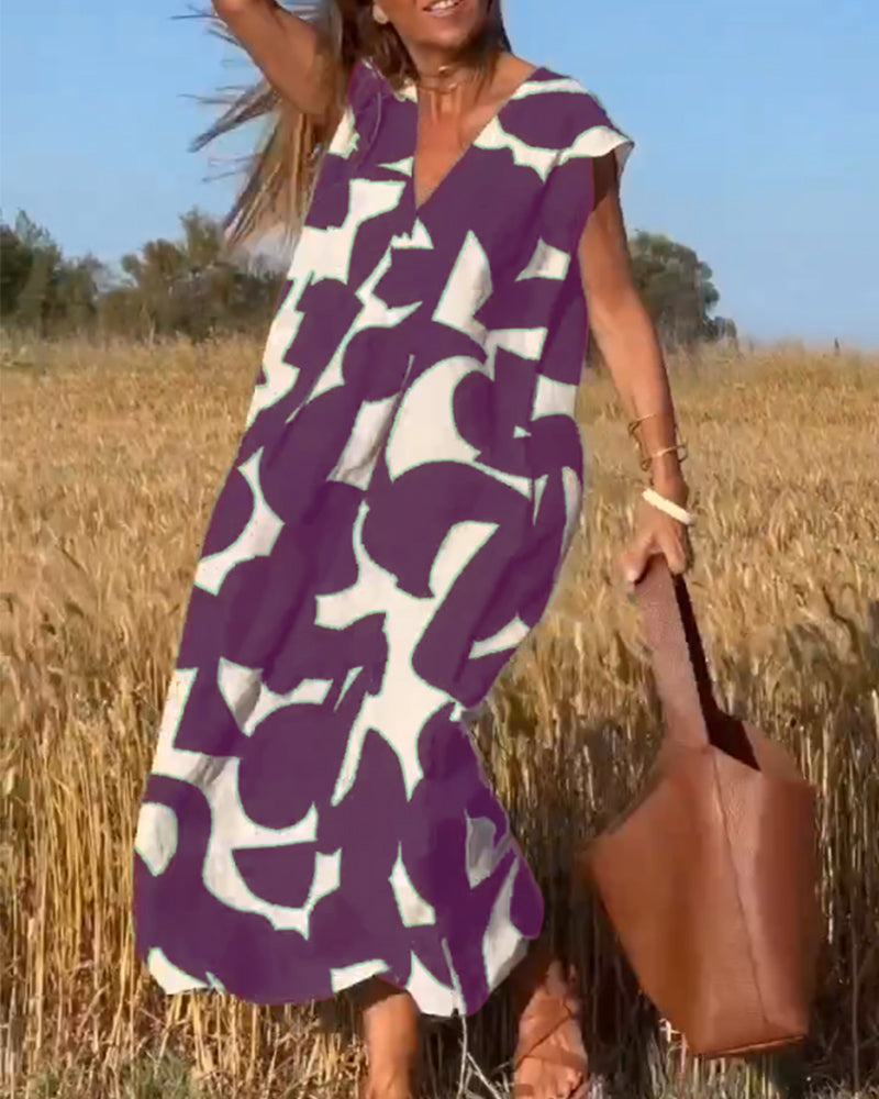 NAOMI™ | Lange Geprinte Jurk met V-hals en Uitlopende Pasvorm voor een Zomerse Look
