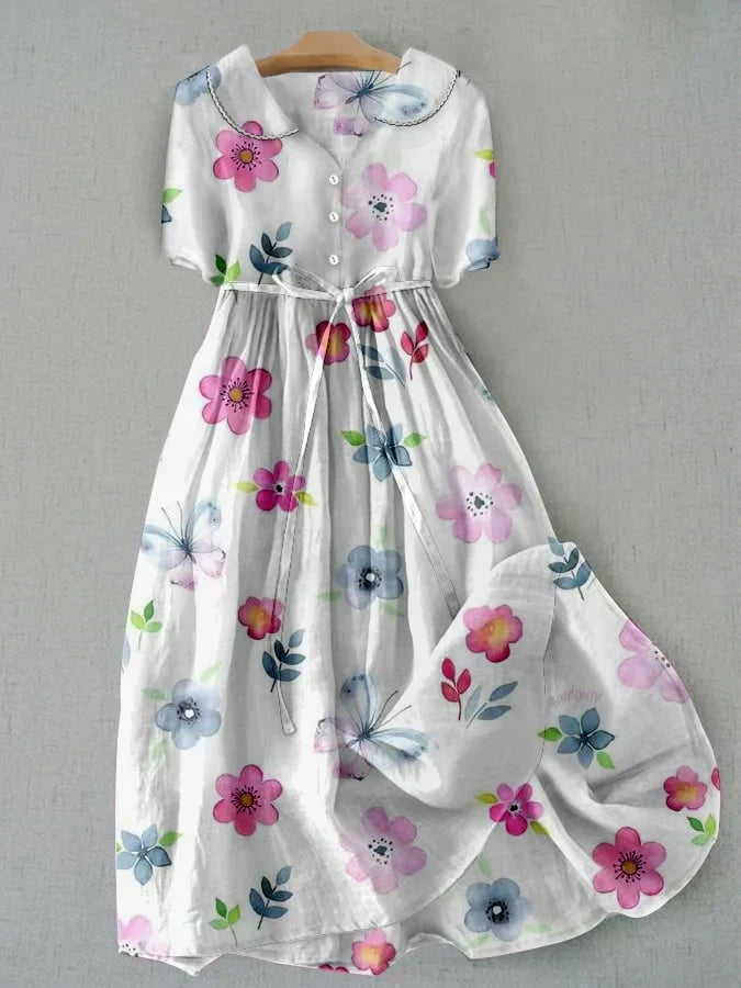 Lyric - Modieuze bloemenjurk met strik in de taille