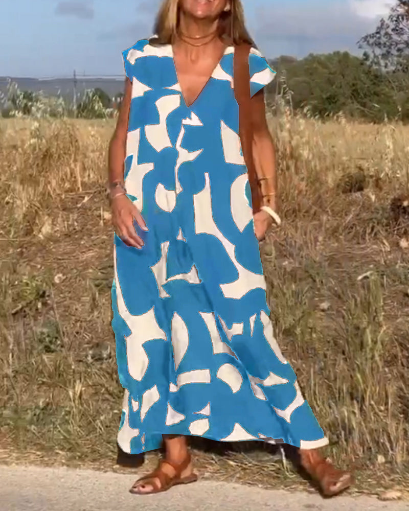 NAOMI™ | Lange Geprinte Jurk met V-hals en Uitlopende Pasvorm voor een Zomerse Look