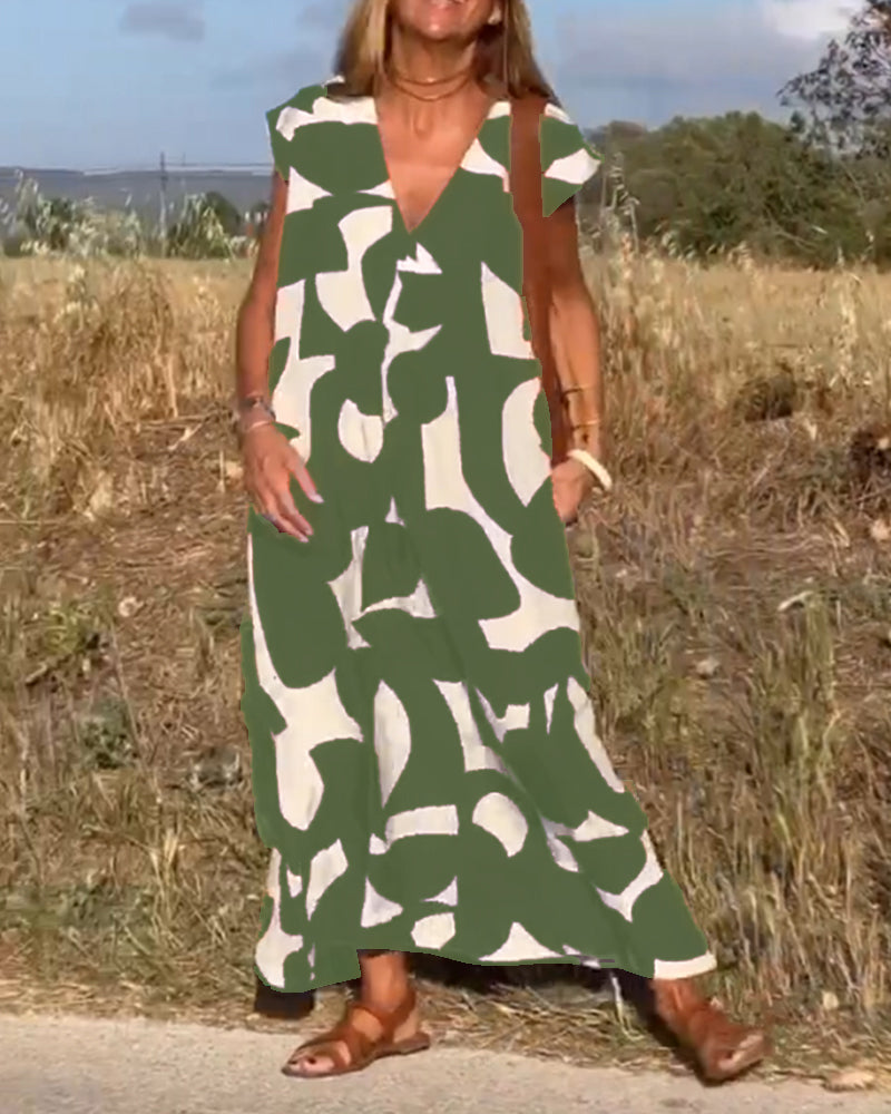 NAOMI™ | Lange Geprinte Jurk met V-hals en Uitlopende Pasvorm voor een Zomerse Look
