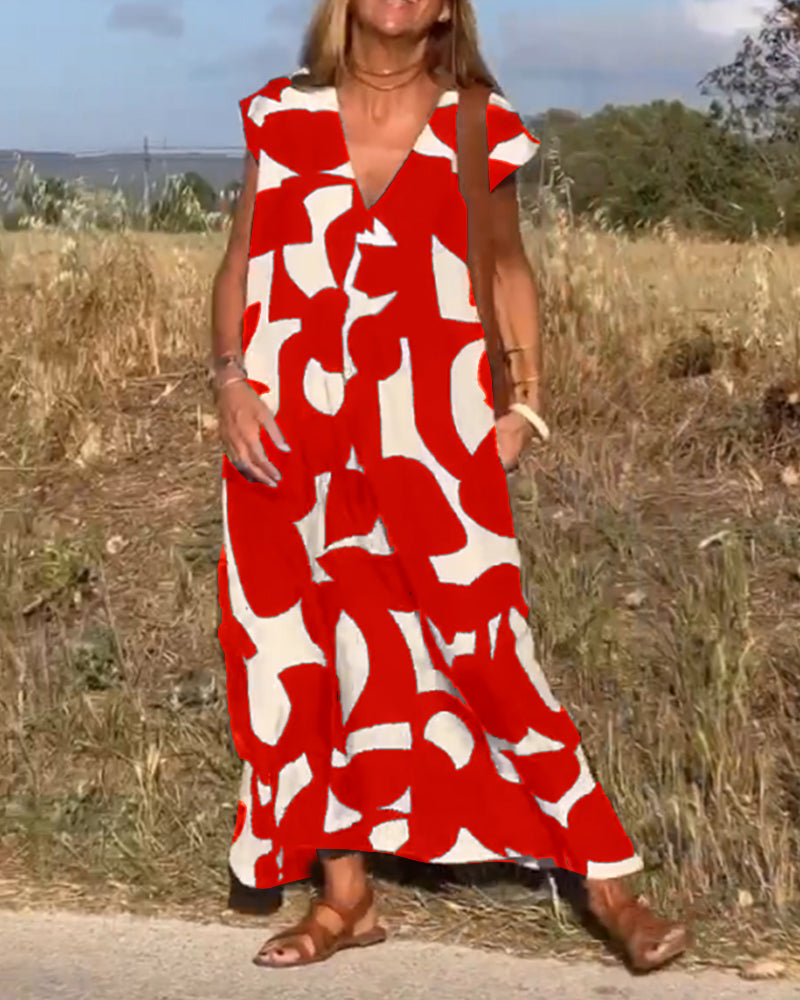 NAOMI™ | Lange Geprinte Jurk met V-hals en Uitlopende Pasvorm voor een Zomerse Look