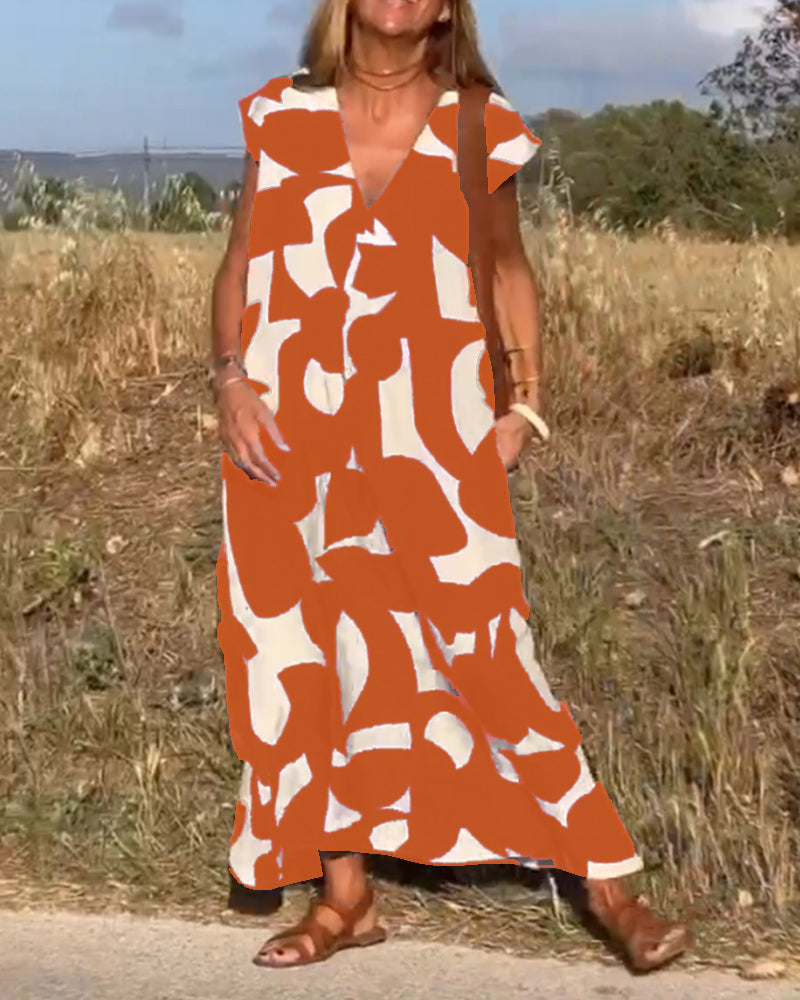 NAOMI™ | Lange Geprinte Jurk met V-hals en Uitlopende Pasvorm voor een Zomerse Look