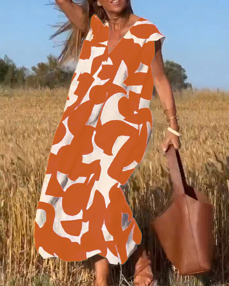 NAOMI™ | Lange Geprinte Jurk met V-hals en Uitlopende Pasvorm voor een Zomerse Look